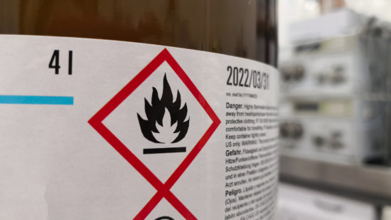 Label of a hazardous flammable chemical in a scientific laboratory